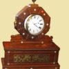Reloj de sobremesa Inglés de palisandro con incrustaciones de nácar y latón. Regency C. 1800