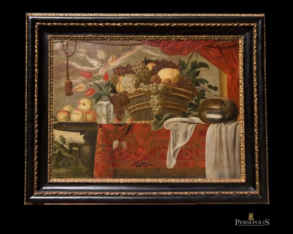 Óleo sobre tela: Bodegón, cesta con frutas y jarrón con flores. Marco talla negro y dorado con oro fino. S. XVII