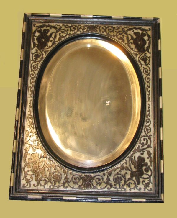 Espejo con marco Lombardo Italiano, de ébano y hueso