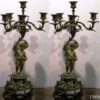 Pareja Candelabros de bronce Luis XV representando niño con cinco candelas. S. XVIII