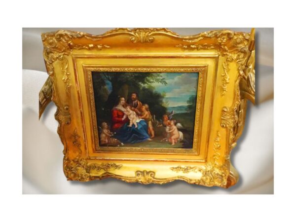 Oil on panel depicting the Holy Family with angels under a tree.
