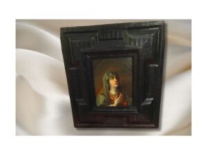 Flemish panel with a Virgin, hands on her chest.