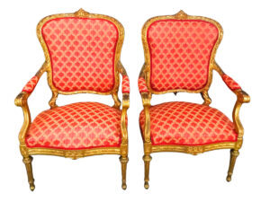 Pareja de Sillones dorados oro fino.