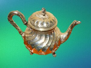 Tetera de Plata con asa.
