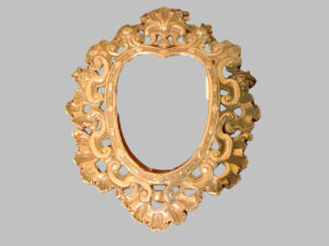 Hand-embossed, heart-shaped silver frame.