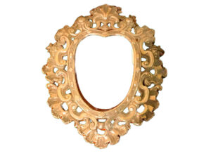 Hand-embossed, heart-shaped silver frame.