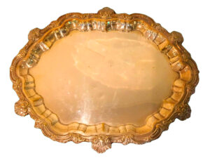 Silver oval tray with chased edges.